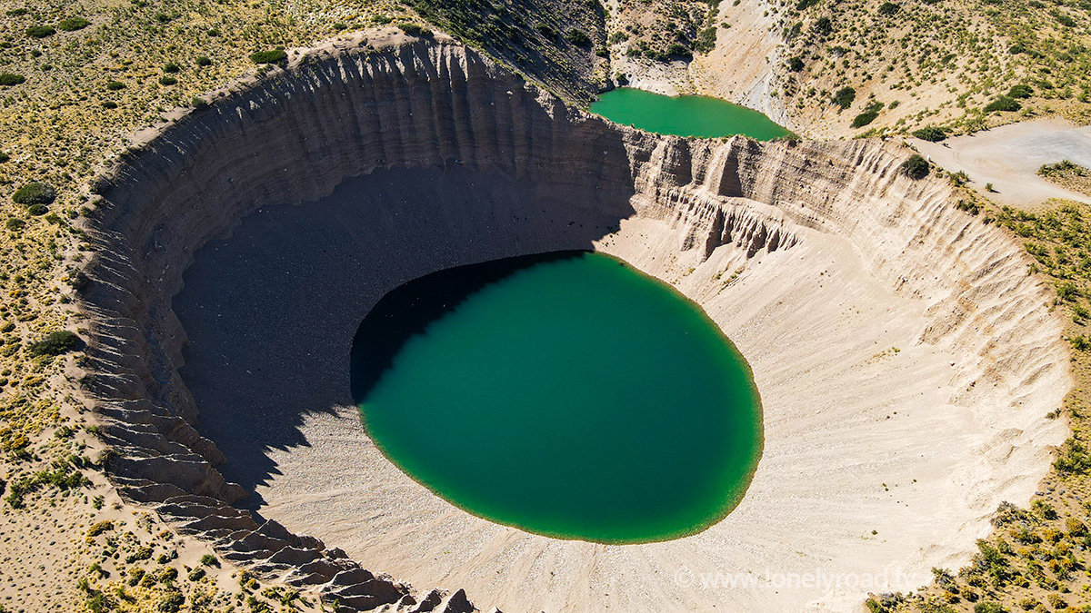 A drone photo from above of the Poza de las Animas sinkholes